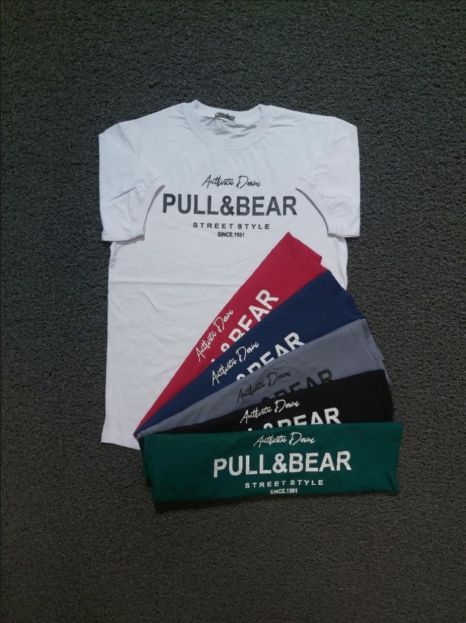 خرید عمده تیشرت سایز L,XL,2XL جنس پنبه سوپر طرح PULL&BEAR دارای رنگ بندی