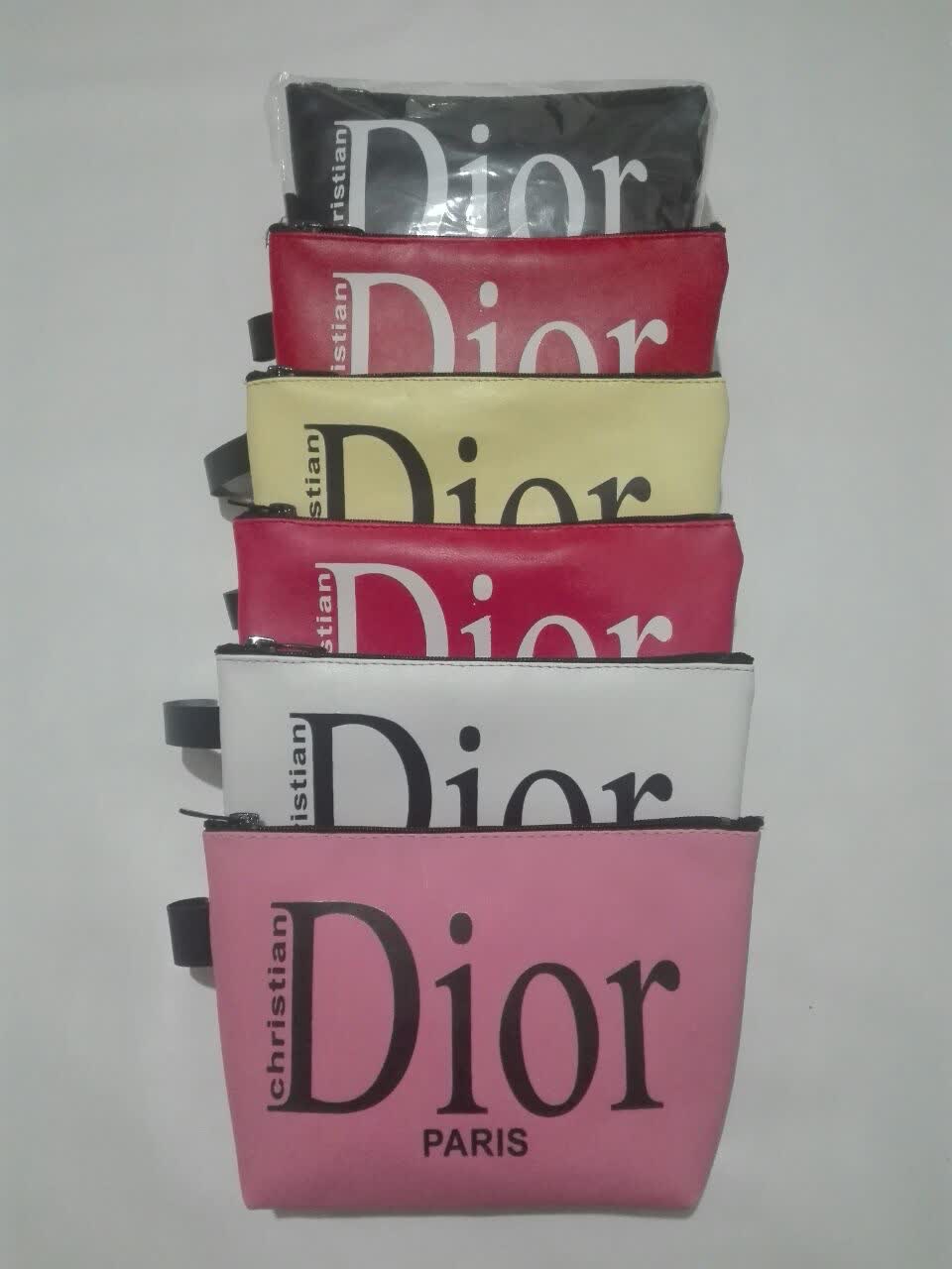 خرید عمده کیف ارایشی از جنس پارچه چرم مصنوعی دارای رنگبندی مدلDior